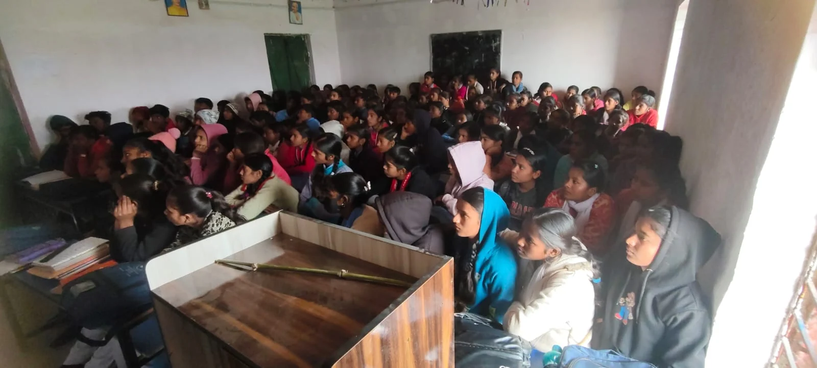 Students gathered in a classroom on a school day